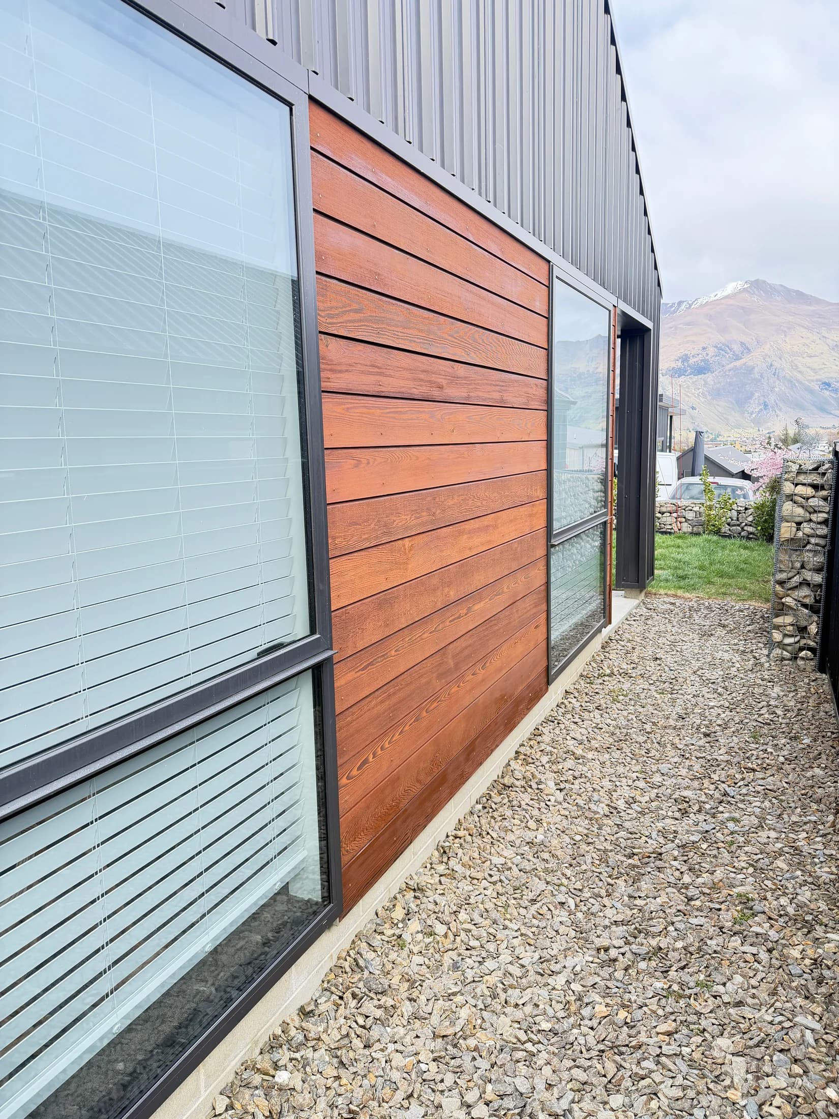 Cedar side cladding after cleaning, brightening and Dryden WoodOil in Wānaka