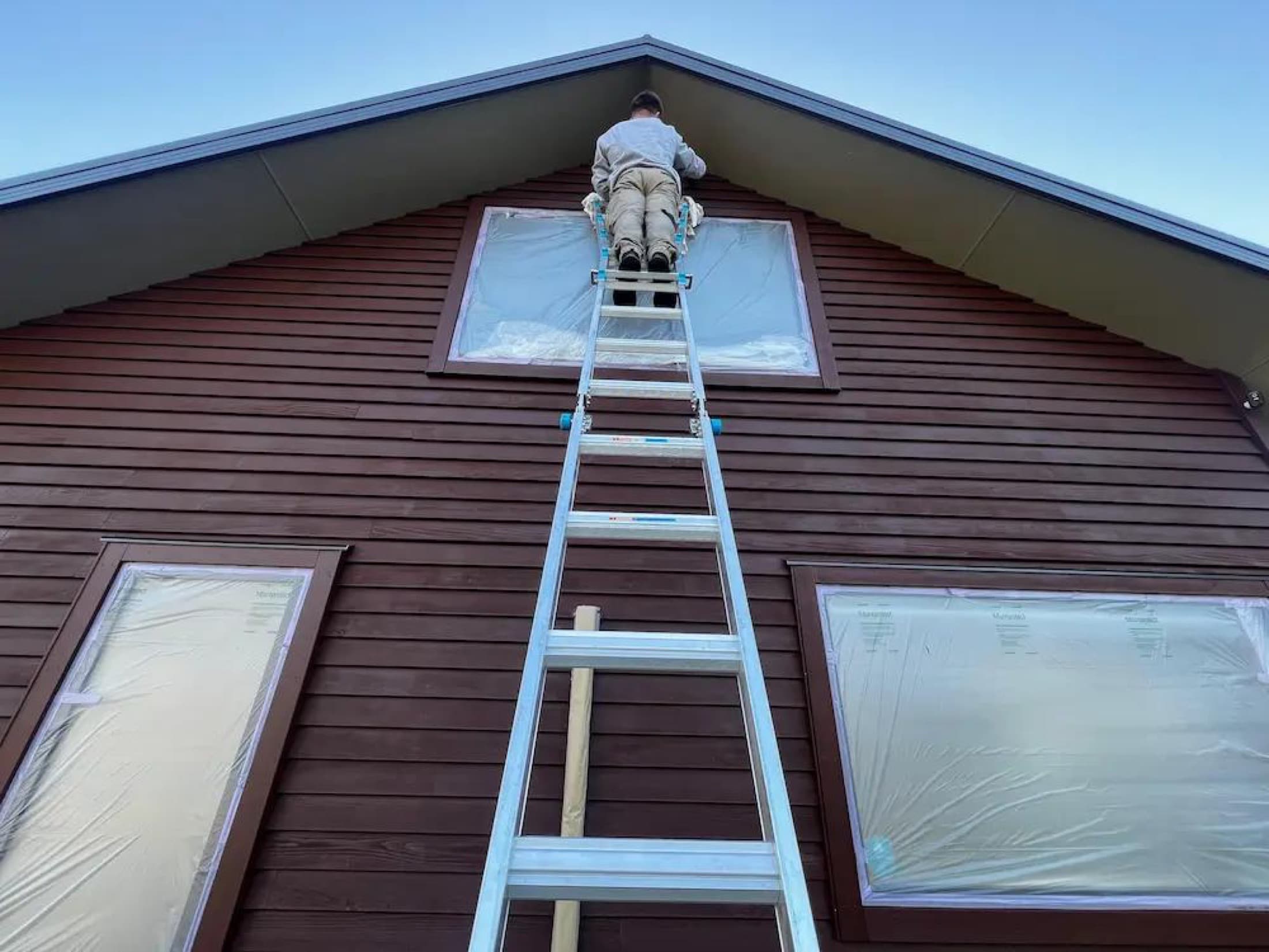 Masking windows on a cedar gable in Lake Hawea