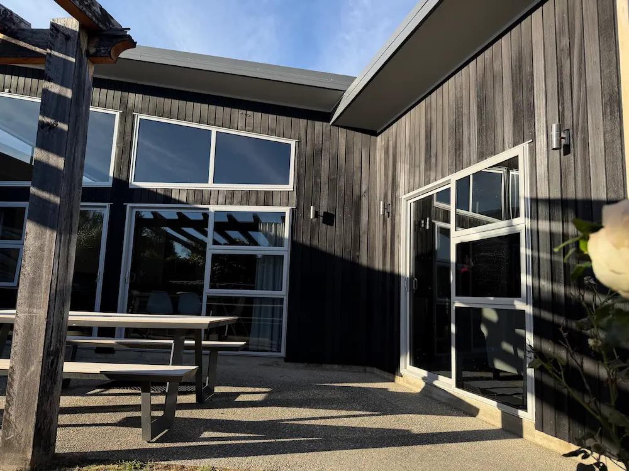 Restored cedar cladding at the rear patio in Albert Town